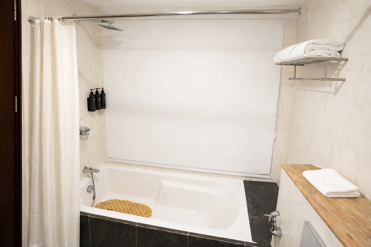 Private bathtub in deluxe room at Amber Palace Hotel Gurgaon