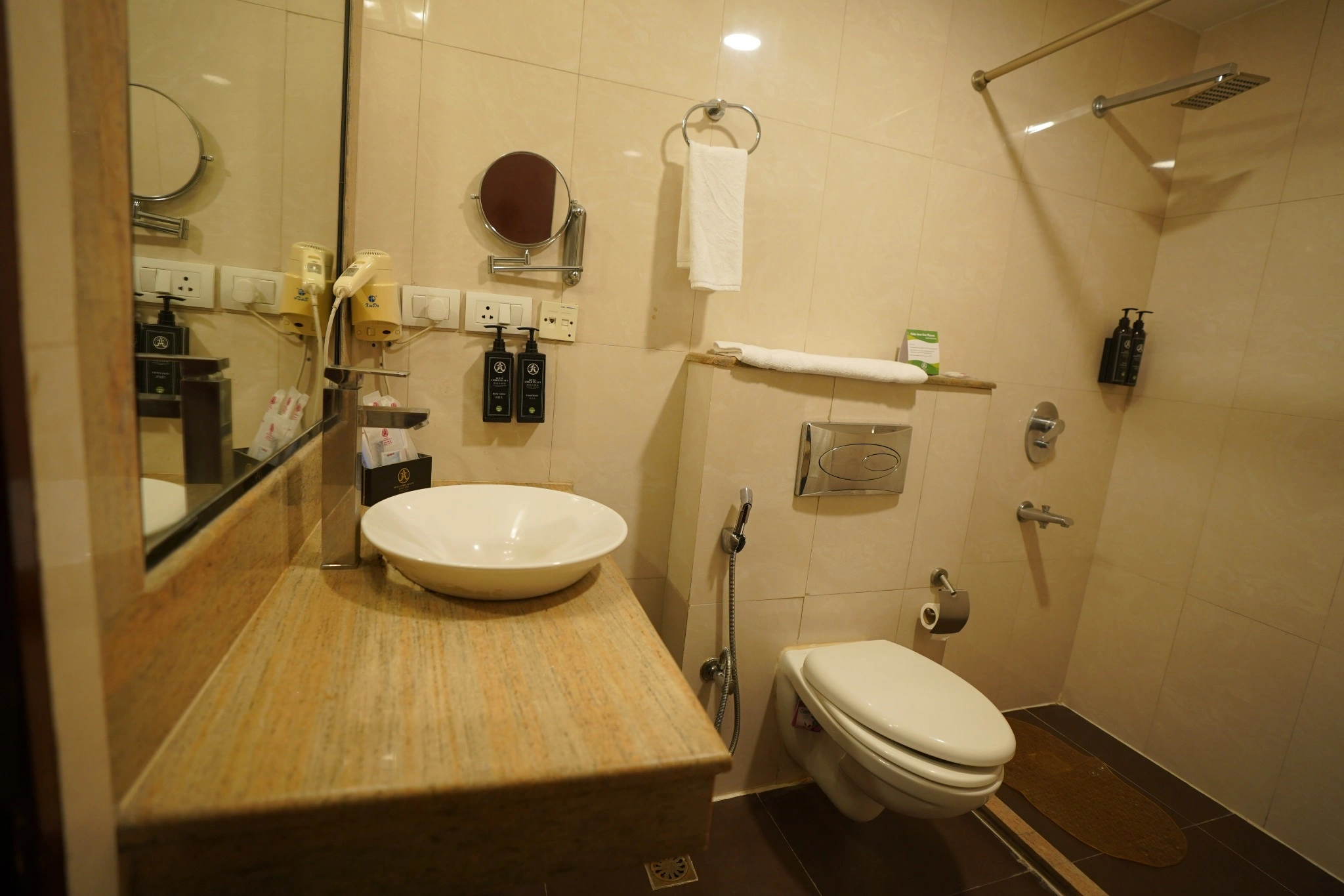 Modern bathroom in deluxe room at Amber Palace Hotel Gurgaon