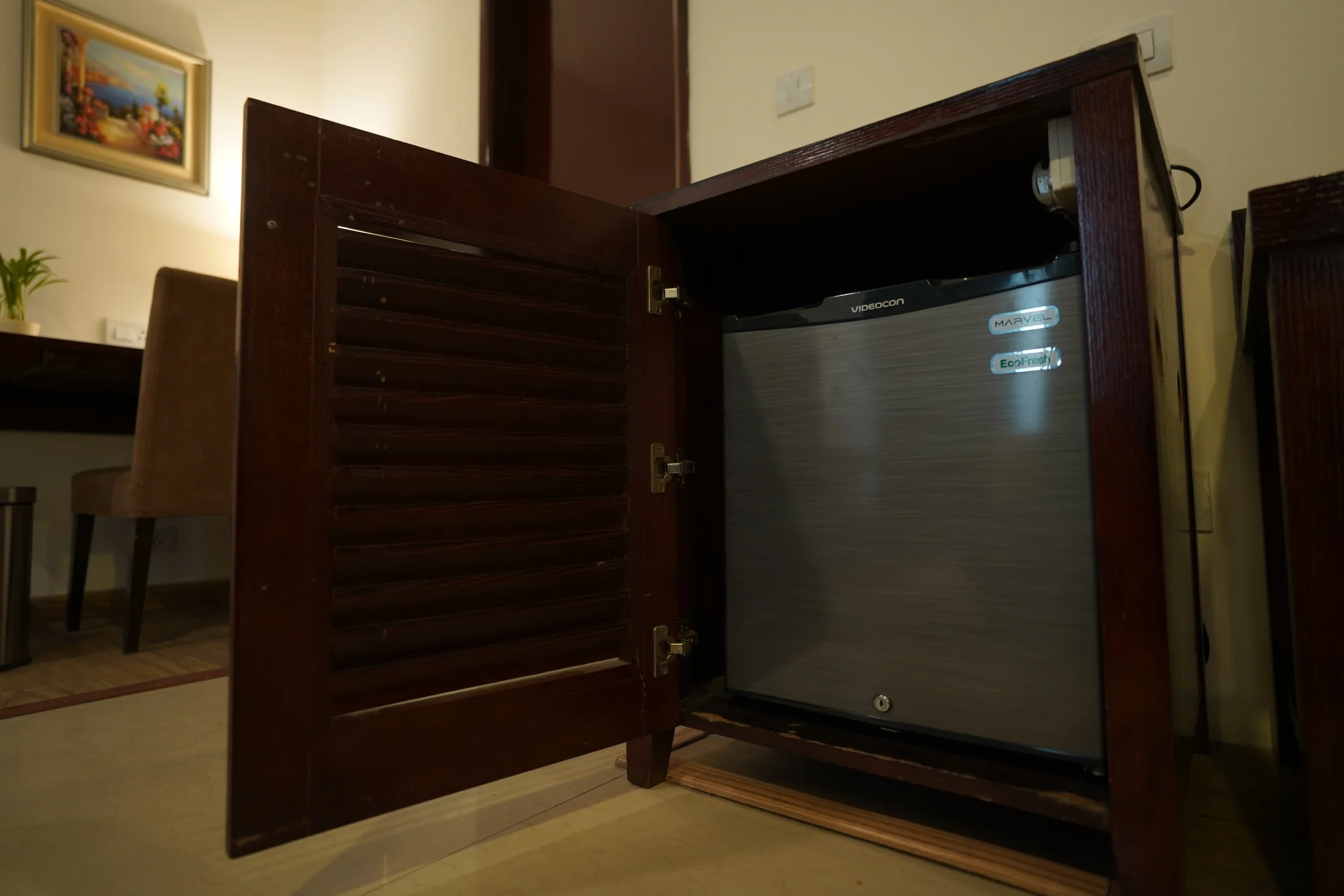 Mini fridge in deluxe room at Amber Palace Hotel Gurgaon