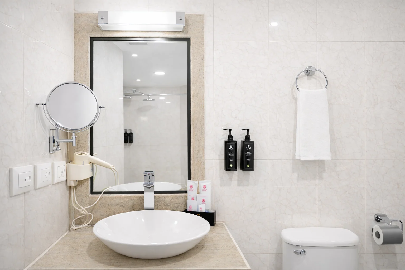 Modern bathroom in premium room at Amber Palace Hotel Gurgaon