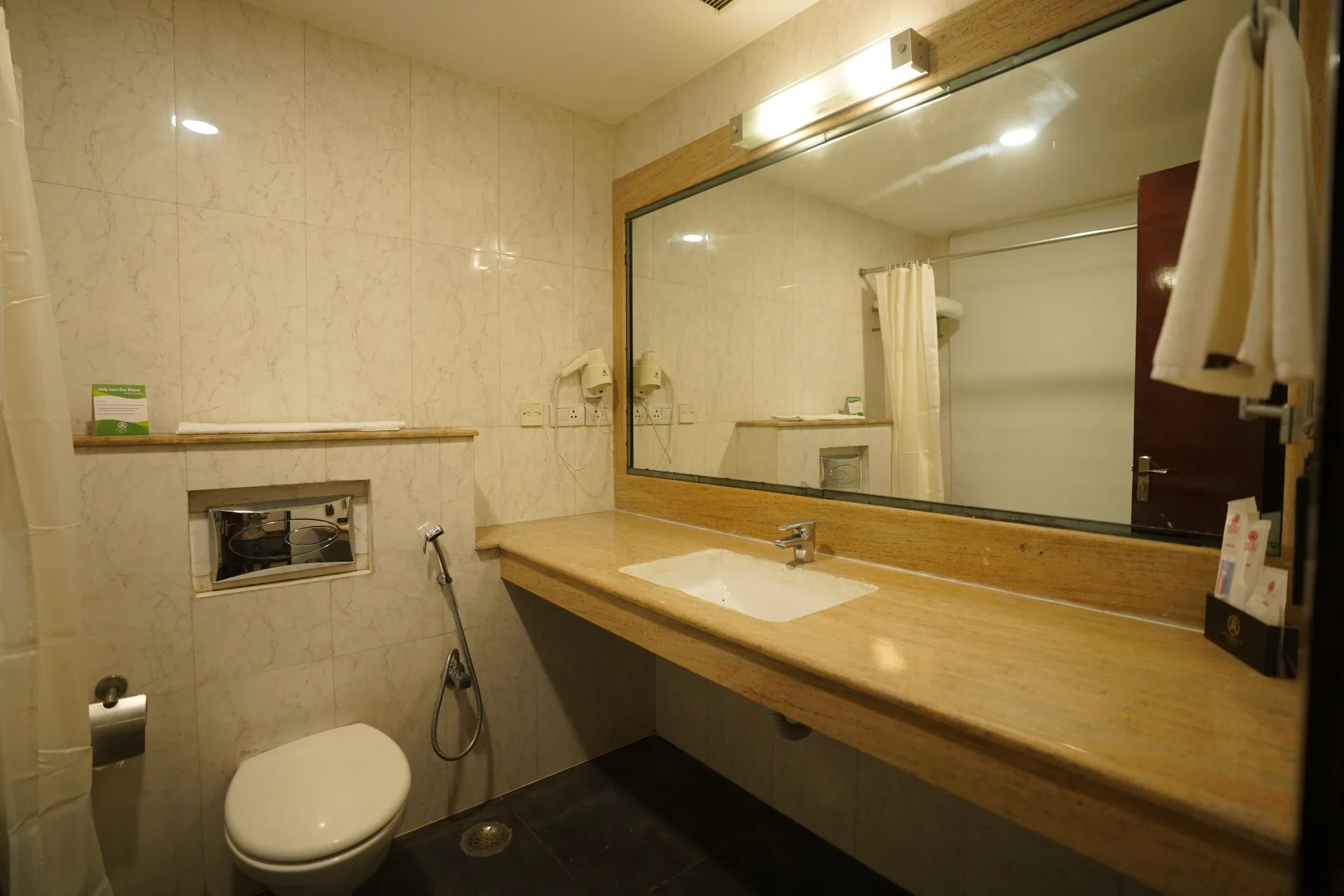 Modern bathroom in premium room at Amber Palace Hotel Gurgaon