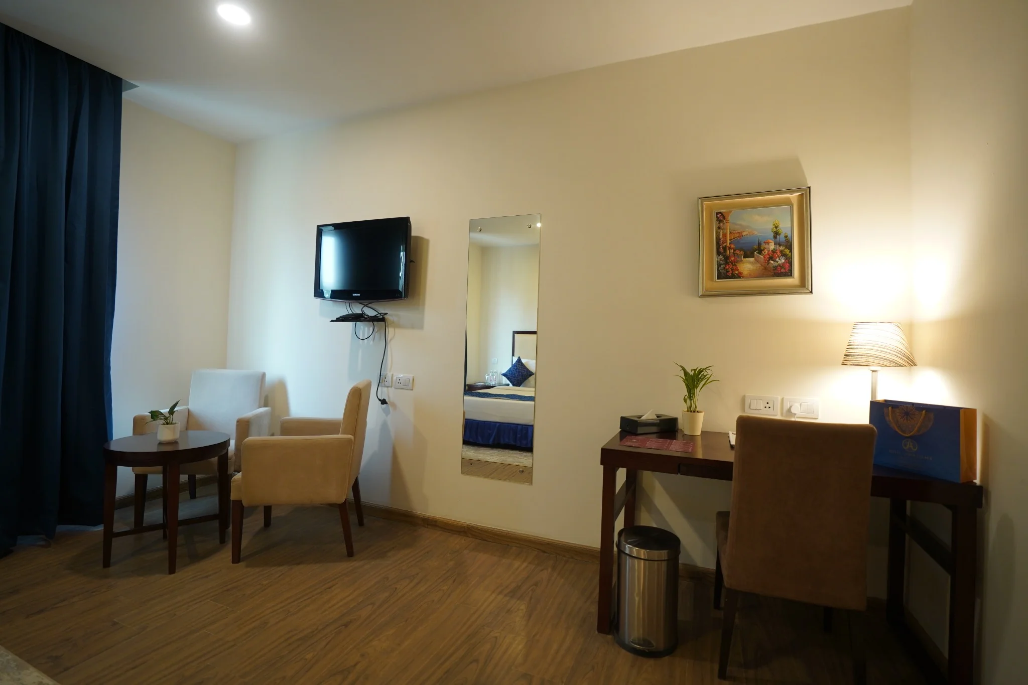 Seating area in premium room at Amber Palace Hotel Gurgaon