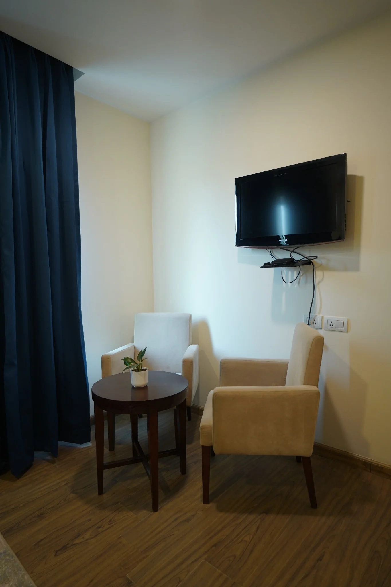 Seating area in premium room at Amber Palace Hotel Gurgaon